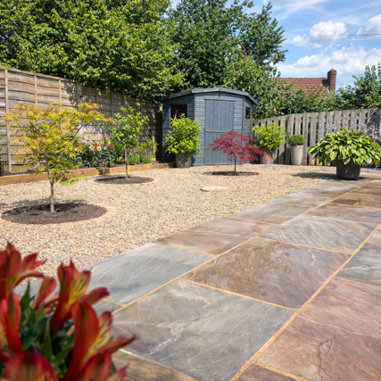 Autumn brown sandstone, timber deck and sleeper bed Autumn brown sandstone, timber deck and sleeper bed