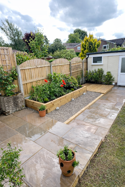 Autumn brown sandstone with timber deck and planter