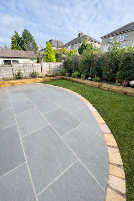 kandla Grey sandstone with tumbled cobbles as edging